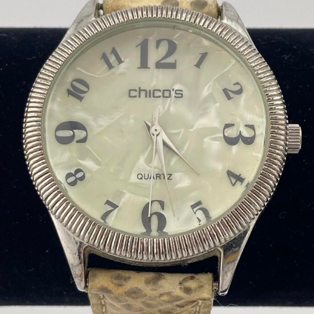CHICOโS Women's Quartz Watch with Beige Snake-Print Leather Strap. It has a styl